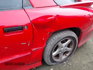 1995 Pontiac Firebird Formula z VIN 2G2FV22P8S2255664, wystawiony jako IAAI lot #42580637 z przebiegiem 148 677 mil mil oraz . Historia ofert i sprzedaży dostępna na DreamBid. Obrazek 14.