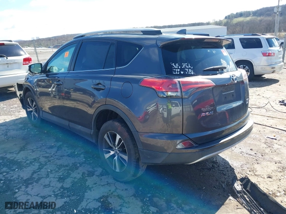 2016 Toyota RAV4 XLE with VIN 2T3RFREV4GW437875, listed as a IAAI auction lot 41694951 with 136,098 mi miles. Bid and sale history available at carsss.com. Image 3.