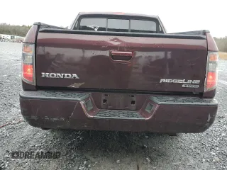 2007 Honda Ridgeline RTL z VIN 2HJYK16517H527441, wystawiony jako Copart lot #41366205 z przebiegiem 266 566 mil mil oraz Szkoda całkowita • Salvage title. Historia ofert i sprzedaży dostępna na DreamBid. Obrazek 6.