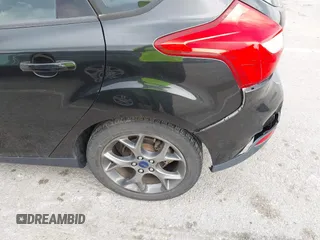 2014 Ford Focus SE with VIN 1FADP3K22EL325404, listed as a IAAI auction lot 42060162 with 115,265 mi miles. Bid and sale history available at carsss.com. Image 12.