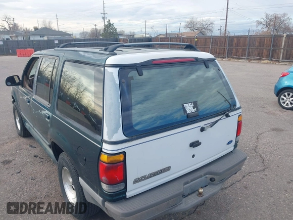 1996 Ford Explorer XL z VIN 1FMDU34X1TUCO1607, wystawiony jako IAAI lot #41182134 z przebiegiem 200 982 mil mil oraz . Historia ofert i sprzedaży dostępna na DreamBid. Obrazek 6.