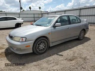 1999 Infiniti G20 z VIN JNKCP11A8XT015021, wystawiony jako Copart lot #67966844 z przebiegiem 268 922 mil mil oraz Szkody całkowita. Historia ofert i sprzedaży dostępna na DreamBid. Obrazek 1.