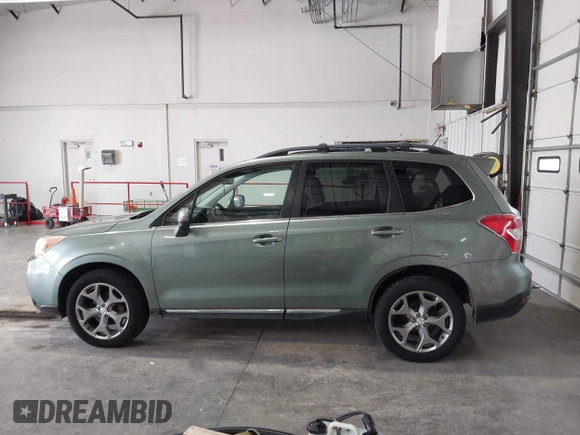 2015 Subaru Forester Touring with VIN JF2SJAUC5FH518262, listed as a IAAI auction lot 42789542 with 182,869 mi miles and . Bid and sale history available at DreamBid. Image 14.