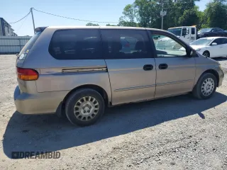 2004 Honda Odyssey LX with VIN 5FNRL18574B102634, listed as a Copart auction lot 54669075 with 141,057 mi miles and Salvage title. Bid and sale history available at DreamBid. Image 3.