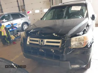 2007 Honda Pilot EX-L with VIN 2HKYF18647H504953, listed as a IAAI auction lot 41750435 with 186,097 mi miles and . Bid and sale history available at DreamBid. Image 6.