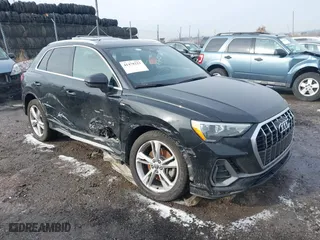 2021 Audi Q3 S line Premium with VIN WA1DECF31M1004512, listed as a IAAI auction lot 41478223 with 83,409 mi miles. Bid and sale history available at carsss.com. Image 1.