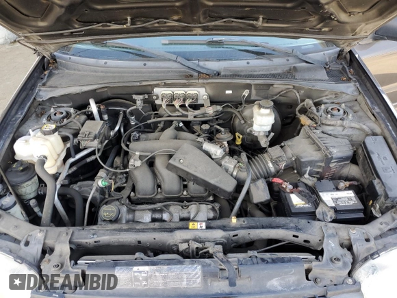 2006 Ford Escape XLT с VIN 1FMYU93146KC65657, выставлен на аукционе Copart как лот 52953835 с пробегом 164 012 миль миль и Списание • Salvage title. История ставок и продаж доступна на DreamBid. Изображение 13.