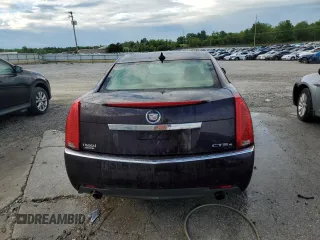 2009 Cadillac CTS AWD z VIN 1G6DG577190129300, wystawiony jako Copart lot #55802785 z przebiegiem 166 399 mil mil oraz Szkoda całkowita • Salvage title. Historia ofert i sprzedaży dostępna na DreamBid. Obrazek 6.