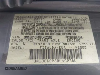2011 Nissan Versa S z VIN 3N1BC1CP8BL402386, wystawiony jako IAAI lot #42389550 z przebiegiem 159 600 mil mil oraz . Historia ofert i sprzedaży dostępna na DreamBid. Obrazek 9.