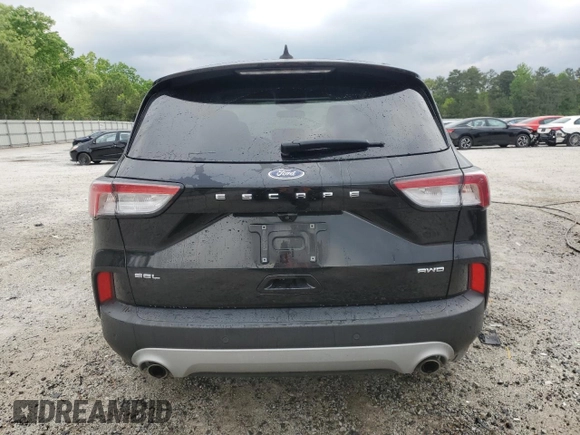 2021 Ford Escape SEL with VIN 1FMCU9H67MUA65808, listed as a Copart auction lot 53209275 with 122,335 mi miles and Clean Title. Bid and sale history available at DreamBid. Image 6.