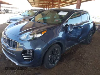 2019 Kia Sportage EX z VIN KNDPN3AC5K7539461, wystawiony jako IAAI lot #42180598 z przebiegiem 69 072 mil mil oraz . Historia ofert i sprzedaży dostępna na DreamBid. Obrazek 2.