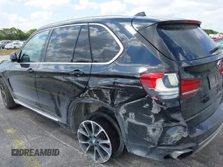 2016 BMW X5 xDrive50i with VIN 5UXKR6C51G0J81658, listed as a IAAI auction lot 41801382 with 34,572 mi miles. Bid and sale history available at carsss.com. Image 18.