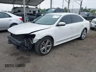2015 Volkswagen Passat 1.8T SE w/Sunroof & Nav with VIN 1VWBT7A31FC043798, listed as a IAAI auction lot 42108289 with 132,442 mi miles. Bid and sale history available at carsss.com. Image 18.