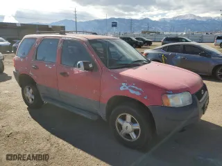 2003 Ford Escape XLS Popular with VIN 1FMYU92193KC06455, listed as a Copart auction lot 88712905 with 0 mi miles and Salvage Title. Bid and sale history available at carsss.com. Image 4.