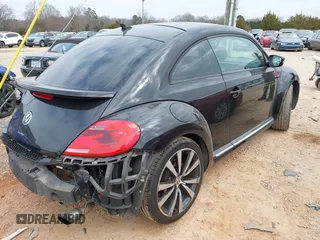2012 Volkswagen Beetle 2.0T Turbo with VIN 3VW467AT9CM658495, listed as a IAAI auction lot 41505160 with 138,842 mi miles. Bid and sale history available at carsss.com. Image 4.