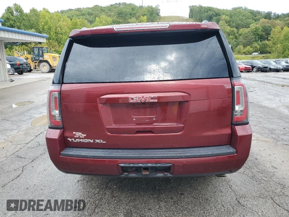 2019 GMC Yukon XL SLT Standard Edition with VIN 1GKS2JKC0KR128371, listed as a Copart auction lot 72687234 with 75,570 mi miles and Salvage Title. Bid and sale history available at carsss.com. Image 6.