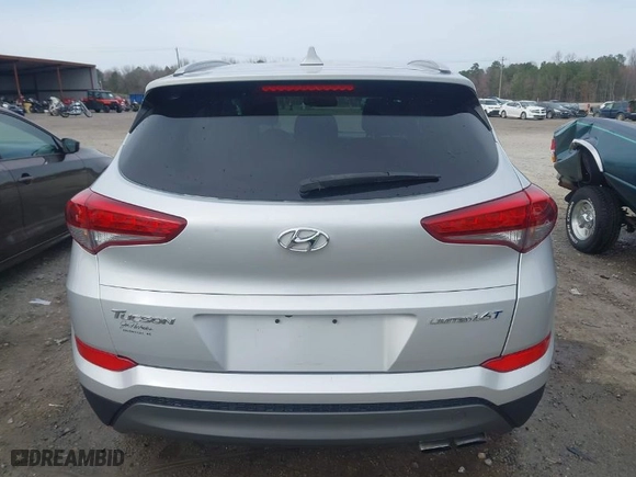 2016 Hyundai Tucson Limited with VIN KM8J33A26GU038537, listed as a IAAI auction lot 41704372 with 106,112 mi miles. Bid and sale history available at carsss.com. Image 16.