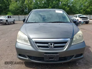 2007 Honda Odyssey EX z VIN 5FNRL38477B406473, wystawiony jako IAAI lot #42364081 z przebiegiem 214 511 mil mil oraz . Historia ofert i sprzedaży dostępna na DreamBid. Obrazek 6.