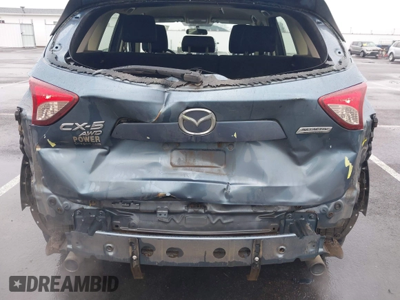 2015 Mazda CX-5 Sport with VIN JM3KE4BY0F0507727, listed as a IAAI auction lot 41249151 with 95,343 mi miles. Bid and sale history available at carsss.com. Image 6.