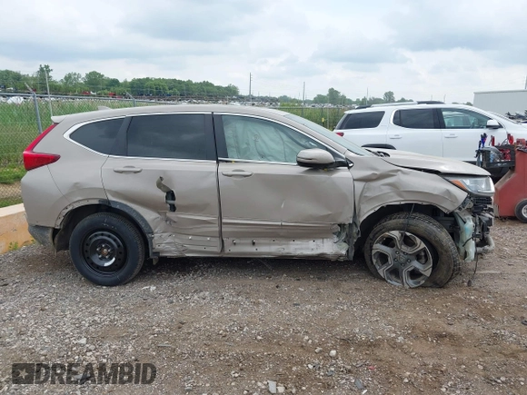 2018 Honda CR-V EX-L z VIN 5J6RW2H89JL011696, wystawiony jako IAAI lot #42521401 z przebiegiem Nie podano mil oraz . Historia ofert i sprzedaży dostępna na DreamBid. Obrazek 13.