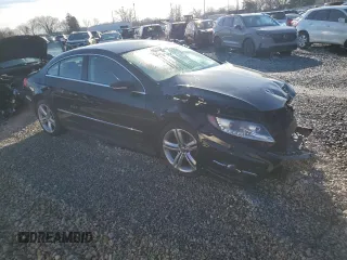 2014 Volkswagen CC R-Line with VIN WVWBP7AN8EE514132, listed as a Copart auction lot 84718544 with 71,879 mi miles and Salvage Title. Bid and sale history available at carsss.com. Image 4.