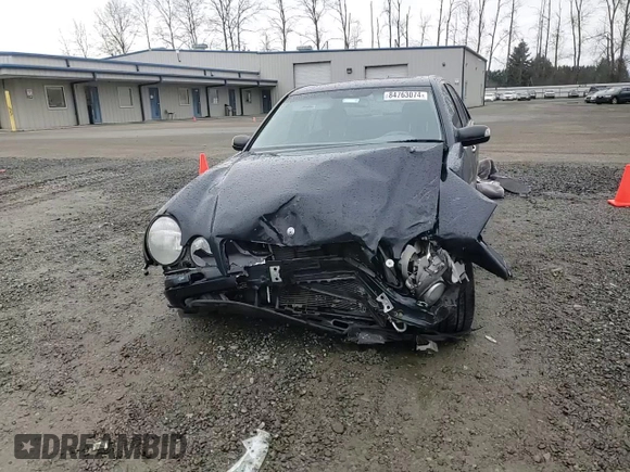 2002 Mercedes-Benz E-Class with VIN WDBJF82J62X063720, listed as a Copart auction lot 84763074 with 0 mi miles and Salvage Title. Bid and sale history available at carsss.com. Image 11.