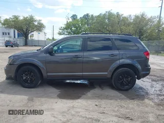 2020 Dodge Journey SE Value with VIN 3C4PDCAB1LT279048, listed as a IAAI auction lot 41810067 with 68,618 mi miles and . Bid and sale history available at carsss.com. Image 14.