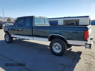 1996 Ford F-250 with VIN 1FTHX26F0TEA38244, listed as a Copart auction lot 88082215 with 255,453 mi miles and Salvage Title. Bid and sale history available at carsss.com. Image 2.