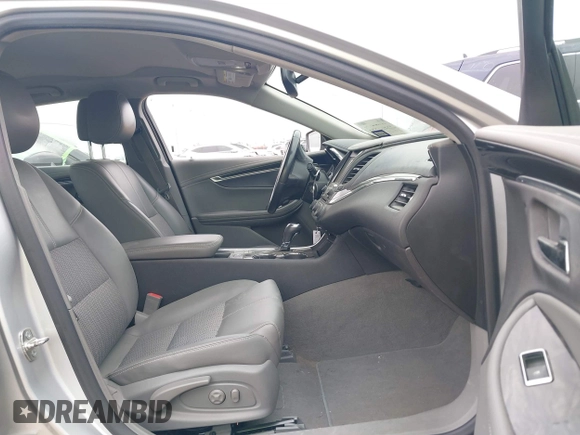 2014 Chevrolet Impala LT with VIN 2G1125S33E9101056, listed as a IAAI auction lot 41877161 with 130,757 mi miles and . Bid and sale history available at DreamBid. Image 5.