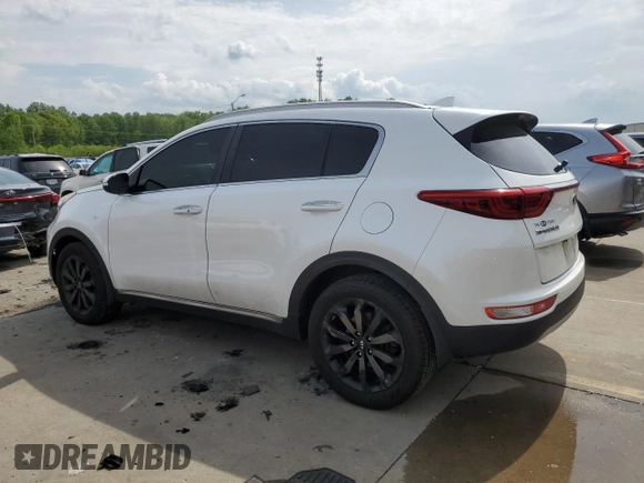 2019 Kia Sportage EX z VIN KNDPNCAC7K7522953, wystawiony jako Copart lot #54906835 z przebiegiem 128 011 mil mil oraz Szkoda całkowita • Salvage title. Historia ofert i sprzedaży dostępna na DreamBid. Obrazek 2.