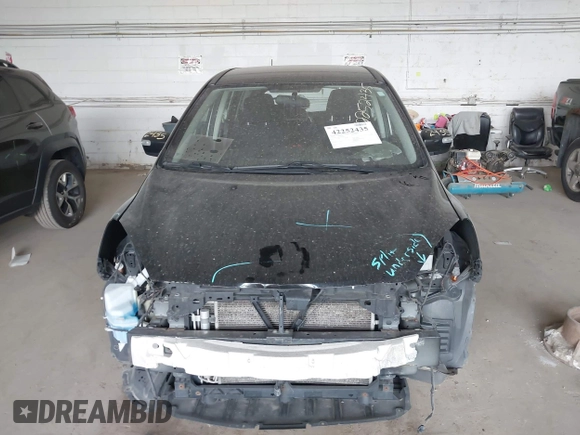 2013 Mazda 5 Sport z VIN JM1CW2BL6D0154104, wystawiony jako IAAI lot #42252435 z przebiegiem 133 413 mil mil oraz . Historia ofert i sprzedaży dostępna na DreamBid. Obrazek 13.