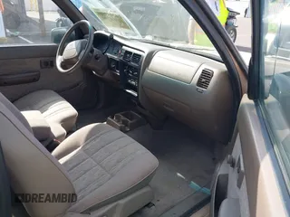1999 Toyota Tacoma with VIN 4TAVL52N4XZ478703, listed as a IAAI auction lot 42504706 with 34,389 mi miles and . Bid and sale history available at DreamBid. Image 5.