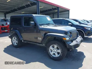 2020 Jeep Wrangler Sport S with VIN 1C4GJXAN6LW303638, listed as a IAAI auction lot 42332473 with 42,854 mi miles and . Bid and sale history available at DreamBid. Image 1.