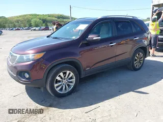 2012 Kia Sorento LX with VIN 5XYKTCA64CG279195, listed as a IAAI auction lot 42144679 with 116,690 mi miles. Bid and sale history available at carsss.com. Image 2.