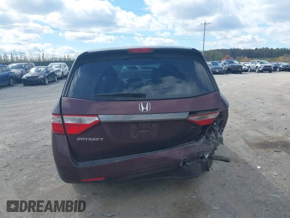 2013 Honda Odyssey LX with VIN 5FNRL5H28DB058401, listed as a IAAI auction lot 42050892 with 221,016 mi miles and . Bid and sale history available at carsss.com. Image 16.