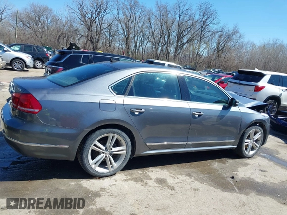 2013 Volkswagen Passat SE with VIN 1VWBN7A3XDC113600, listed as a IAAI auction lot 41826962 with 121,188 mi miles and . Bid and sale history available at DreamBid. Image 14.