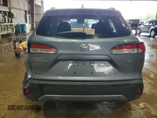 2023 Toyota Corolla Cross LE z VIN 7MUBAAAG4PV042580, wystawiony jako Copart lot #60788025 z przebiegiem 59 576 mil mil oraz Szkoda całkowita • Salvage title. Historia ofert i sprzedaży dostępna na DreamBid. Obrazek 6.
