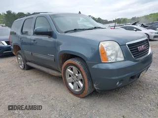 2010 GMC Yukon SLT with VIN 1GKUKCE00AR245212, listed as a IAAI auction lot 42028245 with 245,013 mi miles. Bid and sale history available at carsss.com. Image 1.