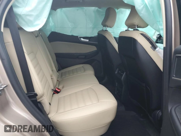 2021 Ford Edge SEL z VIN 2FMPK4J96MBA36322, wystawiony jako Copart lot #56851975 z przebiegiem 10 073 mil mil oraz Czysty tytuł • Clean title. Historia ofert i sprzedaży dostępna na DreamBid. Obrazek 11.