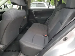 2019 Toyota RAV4 LE with VIN JTMG1RFV4KD004180, listed as a Copart auction lot 57127095 with 71,454 mi miles and Salvage title. Bid and sale history available at DreamBid. Image 11.
