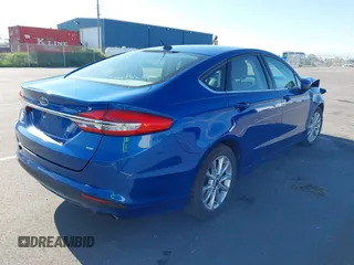 2017 Ford Fusion SE z VIN 3FA6P0H73HR260806, wystawiony jako IAAI lot #42311343 z przebiegiem 143 094 mil mil oraz . Historia ofert i sprzedaży dostępna na DreamBid. Obrazek 4.