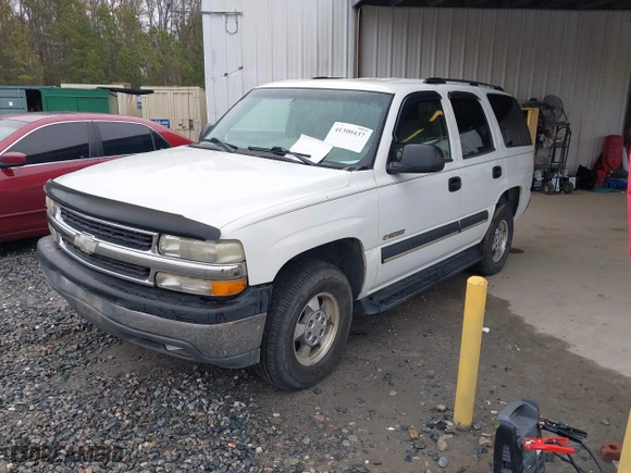 2003 Chevrolet Tahoe LT with VIN 1GNEC13Z63J126611, listed as a IAAI auction lot 41300437 with 313,885 mi miles. Bid and sale history available at carsss.com. Image 2.