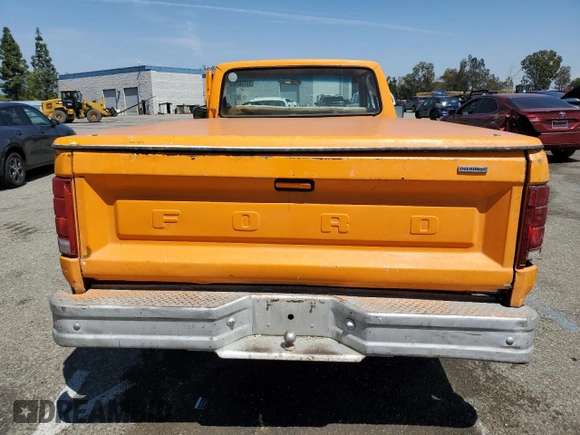 1980 Ford F-150 with VIN F15ERJD0653, listed as a Copart auction lot 52750765 with 27,691 mi miles and Salvage title. Bid and sale history available at DreamBid. Image 6.