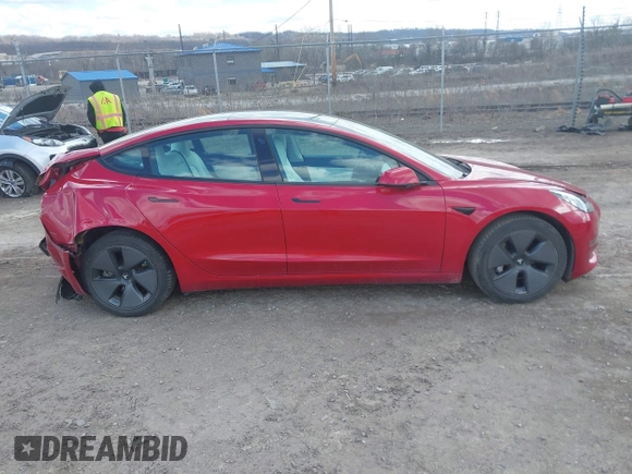 2021 Tesla Model 3 Long Range with VIN 5YJ3E1EB0MF902833, listed as a IAAI auction lot 41854474 with 41,982 mi miles and . Bid and sale history available at DreamBid. Image 13.