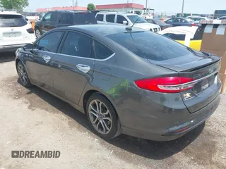 2017 Ford Fusion SE z VIN 3FA6P0HD3HR189144, wystawiony jako IAAI lot #42271155 z przebiegiem 172 146 mil mil oraz . Historia ofert i sprzedaży dostępna na DreamBid. Obrazek 3.