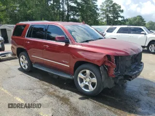 2016 Chevrolet Tahoe LT with VIN 1GNSCBKC2GR264384, listed as a Copart auction lot 60253235 with 184,796 mi miles and Salvage title. Bid and sale history available at DreamBid. Image 4.