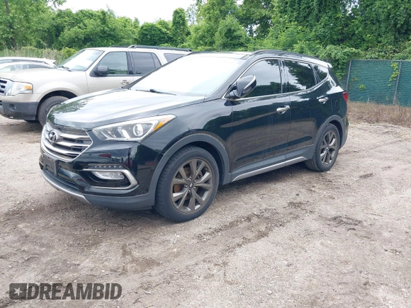 2017 Hyundai Santa Fe Ultimate z VIN 5XYZW4LA9HG416653, wystawiony jako IAAI lot #42350652 z przebiegiem 122 000 mil mil oraz . Historia ofert i sprzedaży dostępna na DreamBid. Obrazek 2.