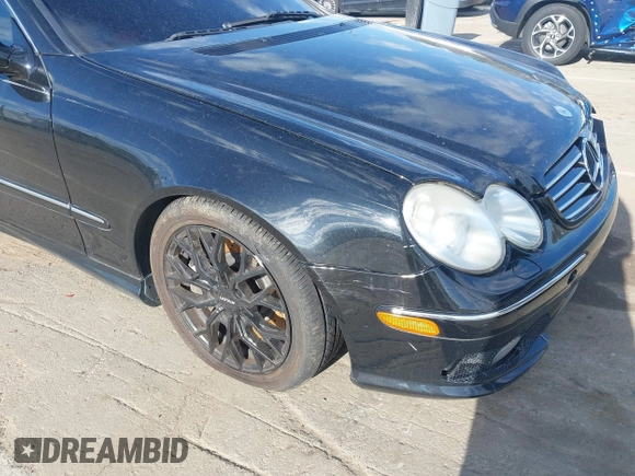 2004 Mercedes-Benz CLK-Class 5.0L with VIN WDBTJ75J14F095156, listed as a IAAI auction lot 41815605 with 176,902 mi miles. Bid and sale history available at carsss.com. Image 12.