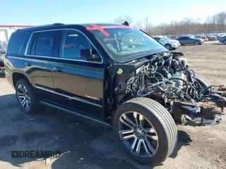 2018 GMC Yukon Denali with VIN 1GKS2CKJ3JR281853, listed as a IAAI auction lot 41946294 with 125,622 mi miles. Bid and sale history available at carsss.com. Image 1.