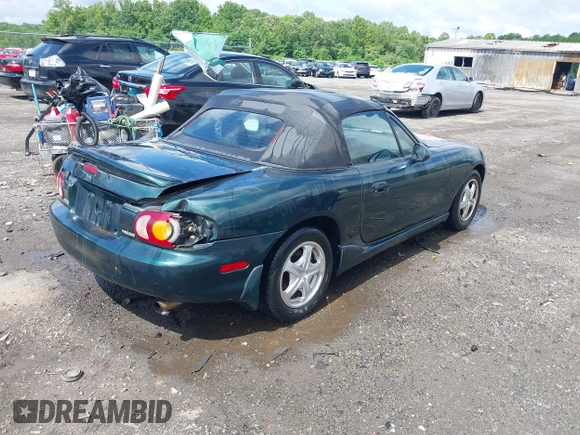 1999 Mazda MX-5 Miata z VIN JM1NB3537X0123440, wystawiony jako IAAI lot #42263294 z przebiegiem 107 356 mil mil oraz . Historia ofert i sprzedaży dostępna na DreamBid. Obrazek 4.